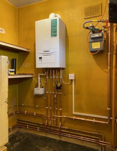 Vaillant boiler installation with gas meter and copper pipework